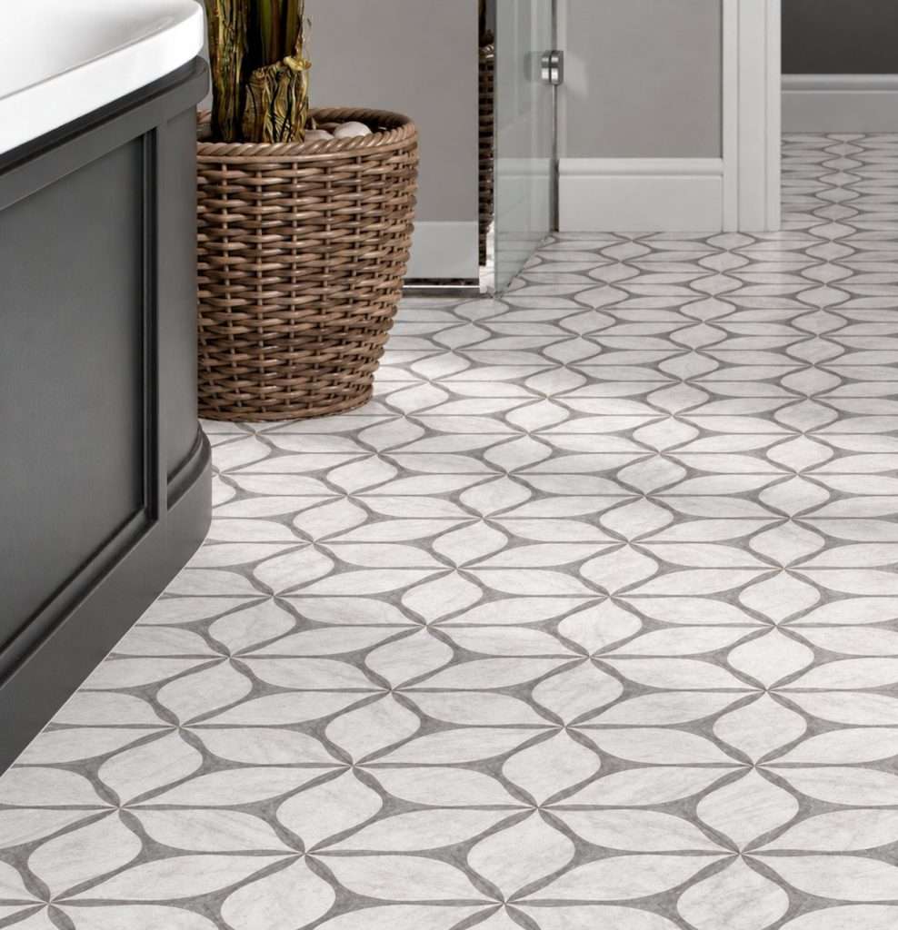 The same patterned bathroom tile with clean, bright grout after cleaning