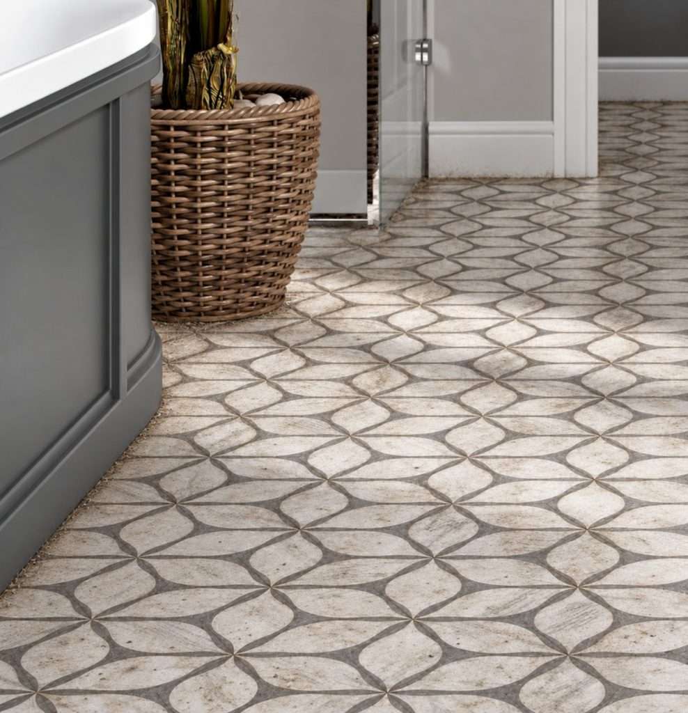 Patterned bathroom tile with dark, dirty grout lines before cleaning